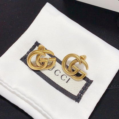 Boucles d'oreilles clous polyvalentes avec logo