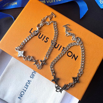 Pulsera de cadena Love en oro y negro