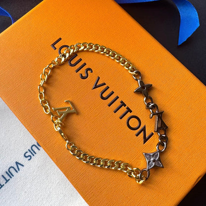 Pulsera de cadena Love en oro y negro