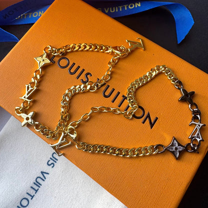 Pulsera de cadena Love en oro y negro