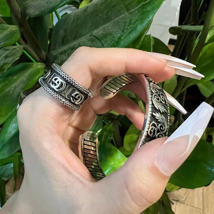 Anelli e bracciale vintage con G