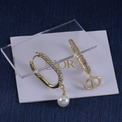 Set di 3 gioielli con orecchini a catena con colomba, bracciale e collana
