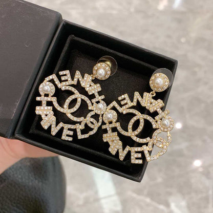 Pendientes de aro brillantes CC